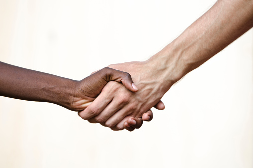 two people shaking hands